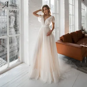 Bohemian Wedding Dresses 2022 Lace Appliques V-neck Cap Sleeves Backless Tulle Sweep Train Beach Bridal Gowns Vestidos De Novia